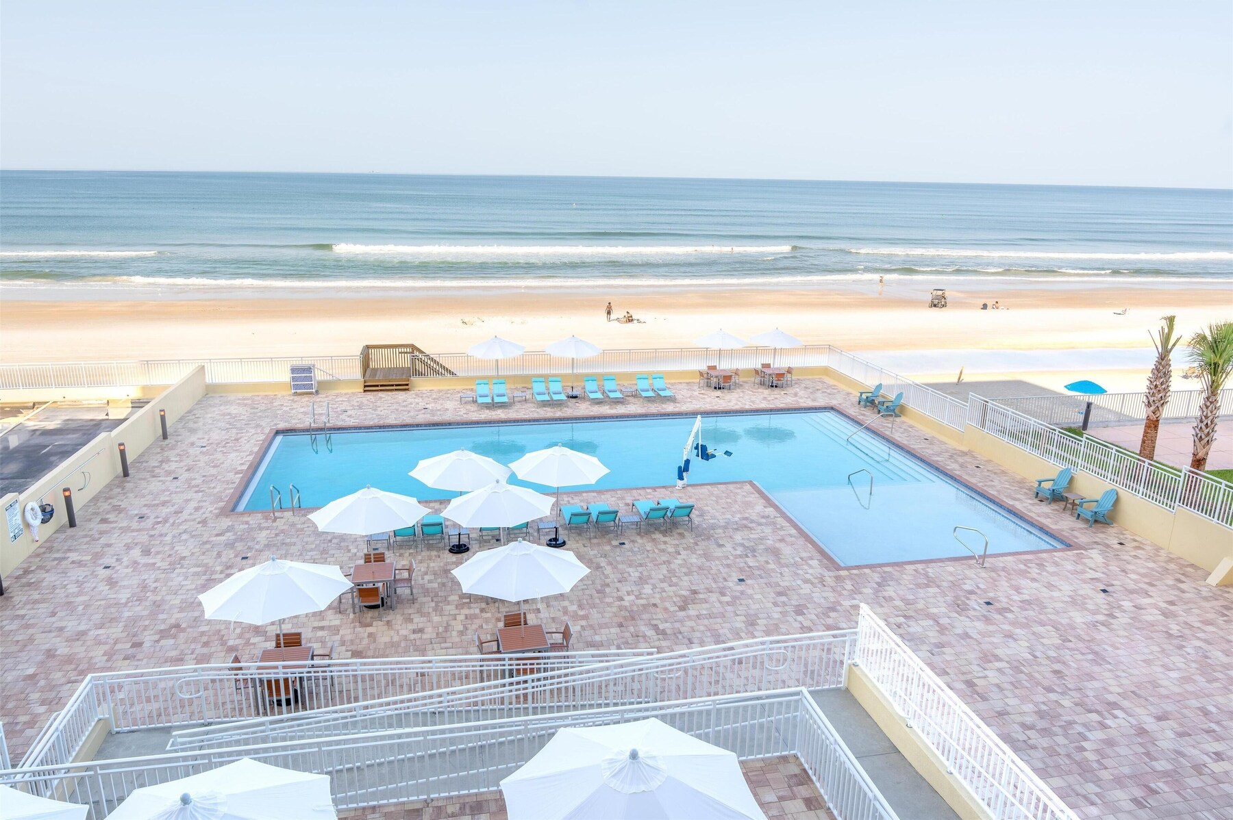 Outdoor pool, open 8:00 AM to 10:00 PM, pool umbrellas