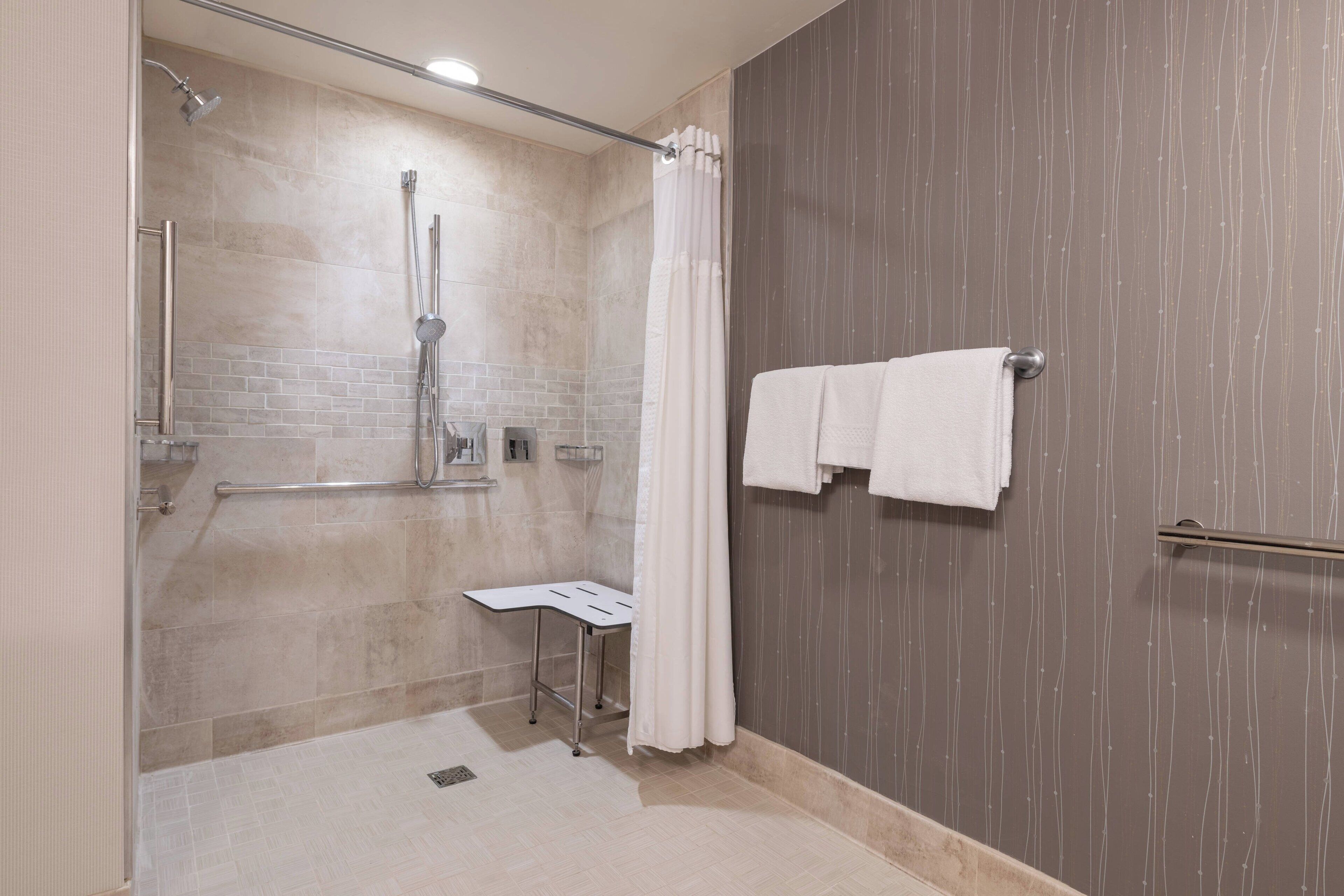 combined shower/bathtub, free toiletries, hair dryer, towels