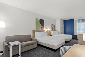 Down duvets, pillow-top beds, desk, laptop workspace