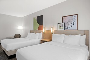 Down duvets, pillow-top beds, desk, laptop workspace