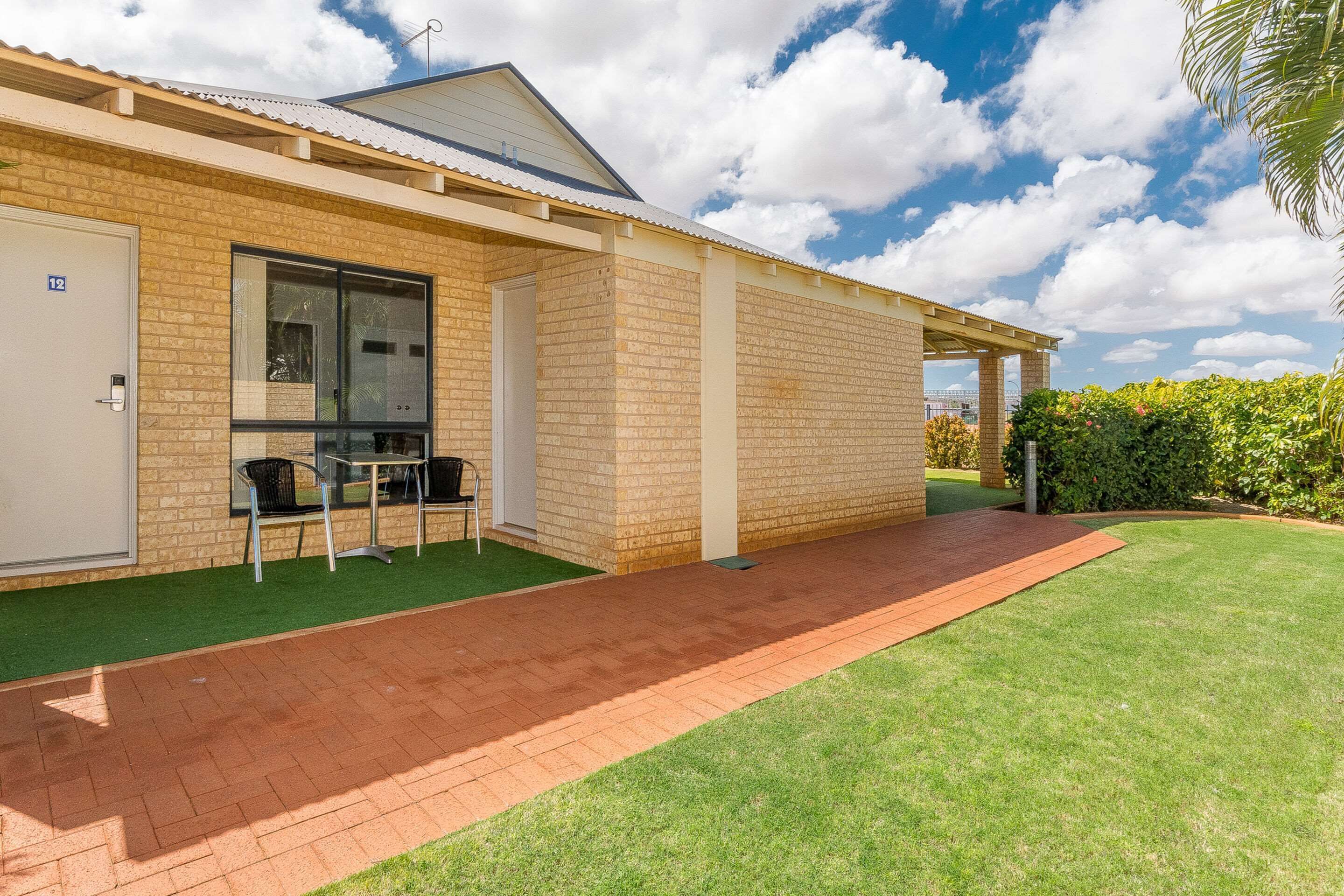 desk, laptop workspace, iron/ironing board, cots/infant beds