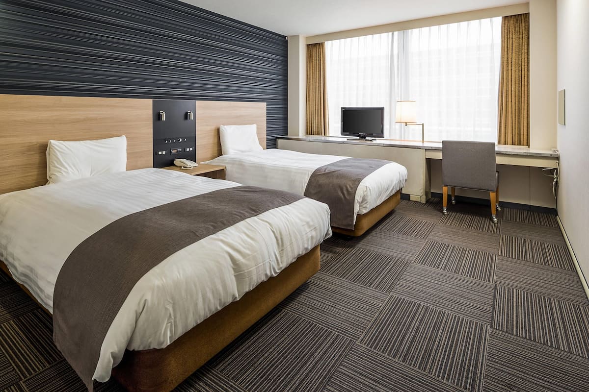 Standard-huone, 2 yhden hengen sänkyä, tupakointi kielletty | Työpöytä, pimennysverhot, äänieristys, ilmainen Wi-Fi