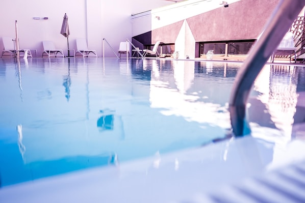 Seasonal outdoor pool, pool loungers