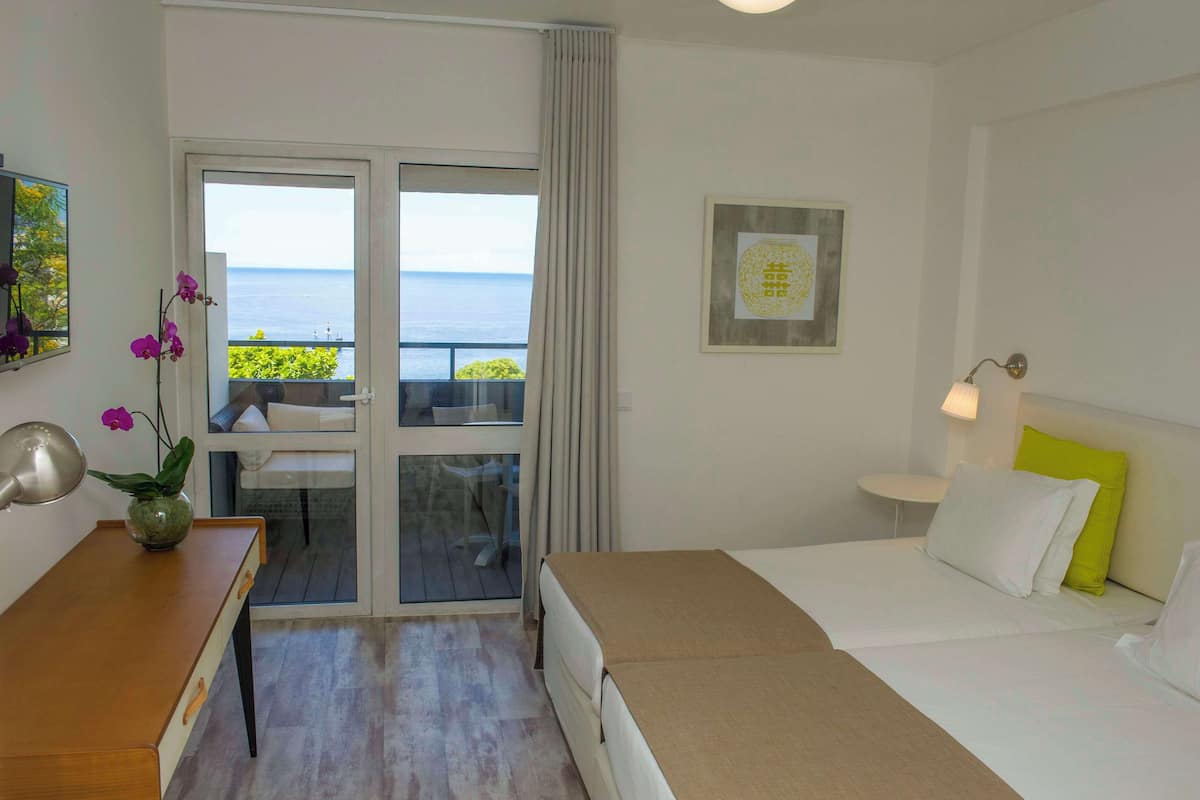 Superior Studio, Sea View | 1 bedroom, desk, laptop workspace, blackout drapes