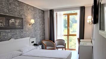Minibar, escriptori, cortines opaques i habitacions insonoritzades