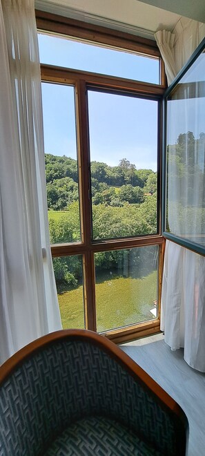 Minibar, bureau, rideaux occultants, chambres insonorisées