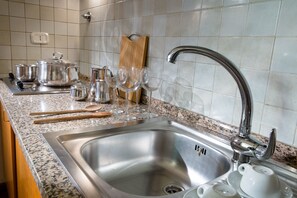 Full-sized fridge, coffee/tea maker