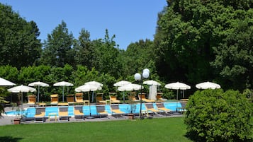 Seasonal outdoor pool, open 9:00 AM to 7:00 PM, pool umbrellas