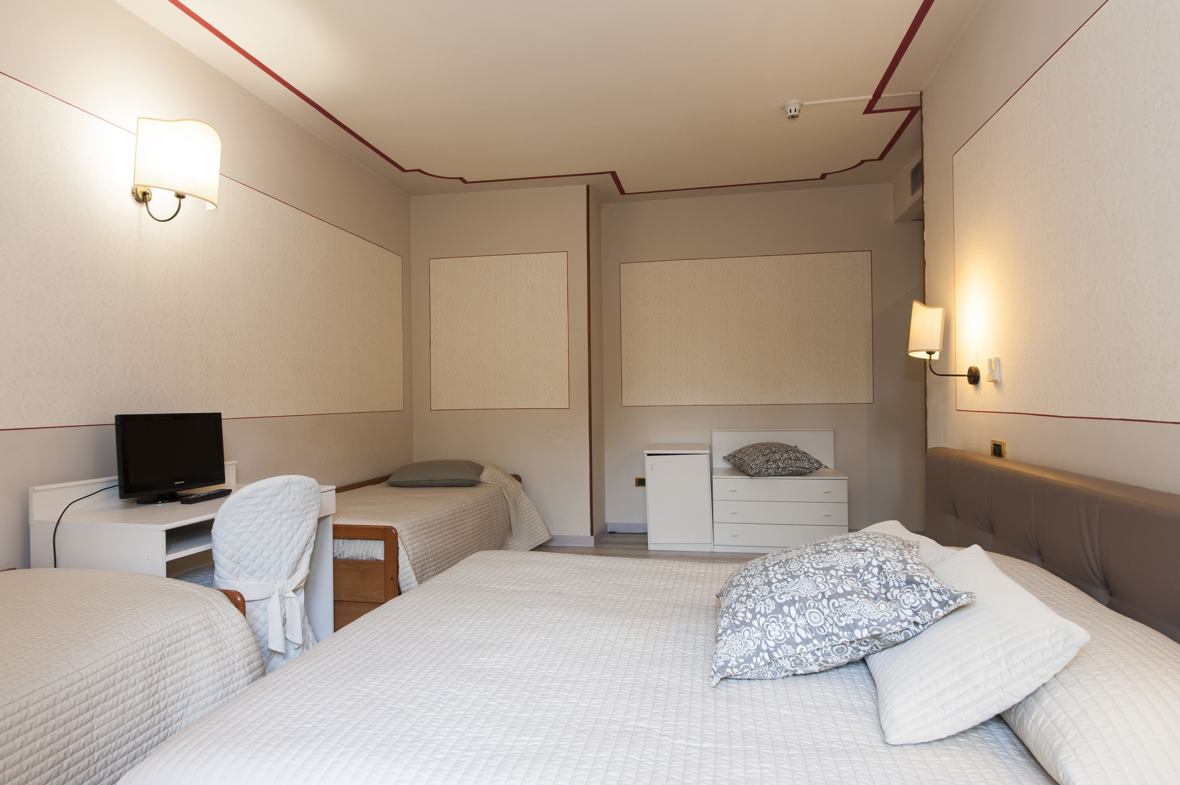 family room | 1 bedroom, minibar, in-room safe, desk