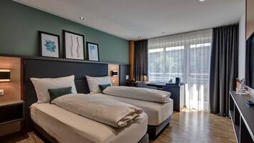 Literie hypoallergénique, minibar, coffres-forts dans les chambres