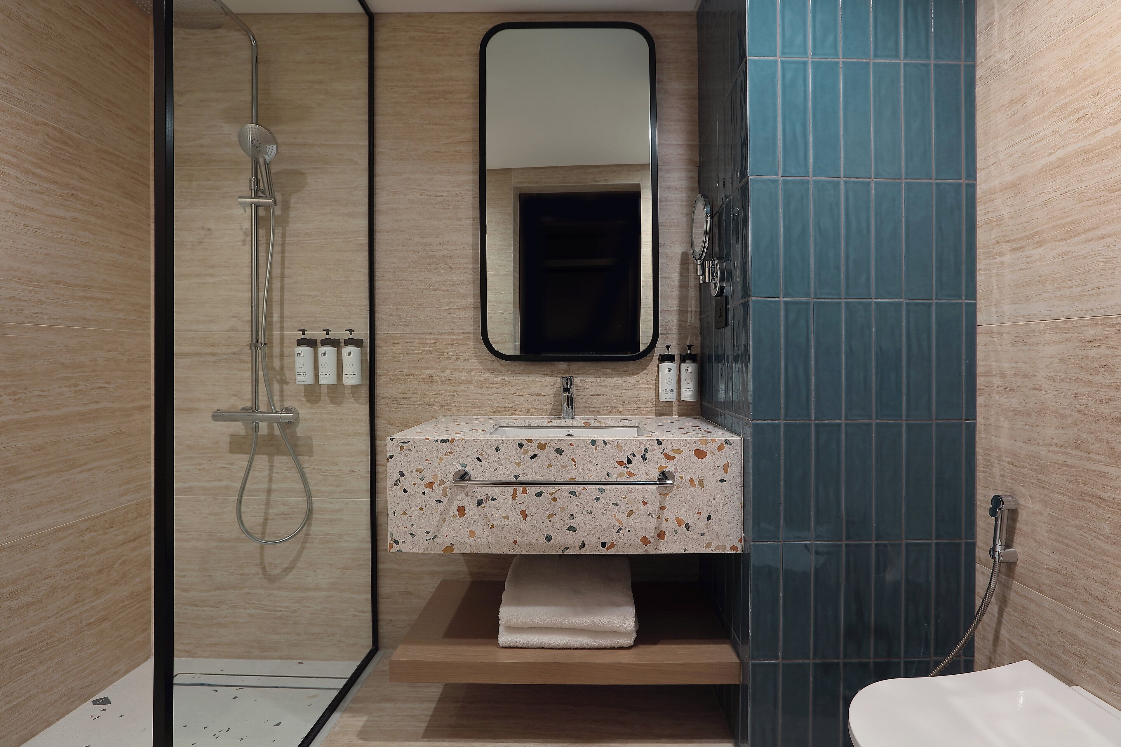 Shower, rainfall showerhead, eco-friendly toiletries, hair dryer