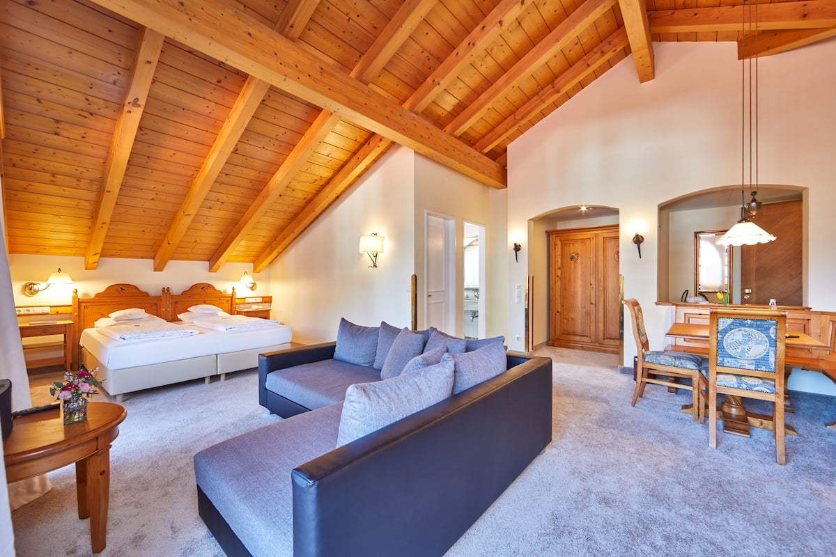 junior suite, mountain view | 1 bedroom, in-room safe, individually furnished, desk