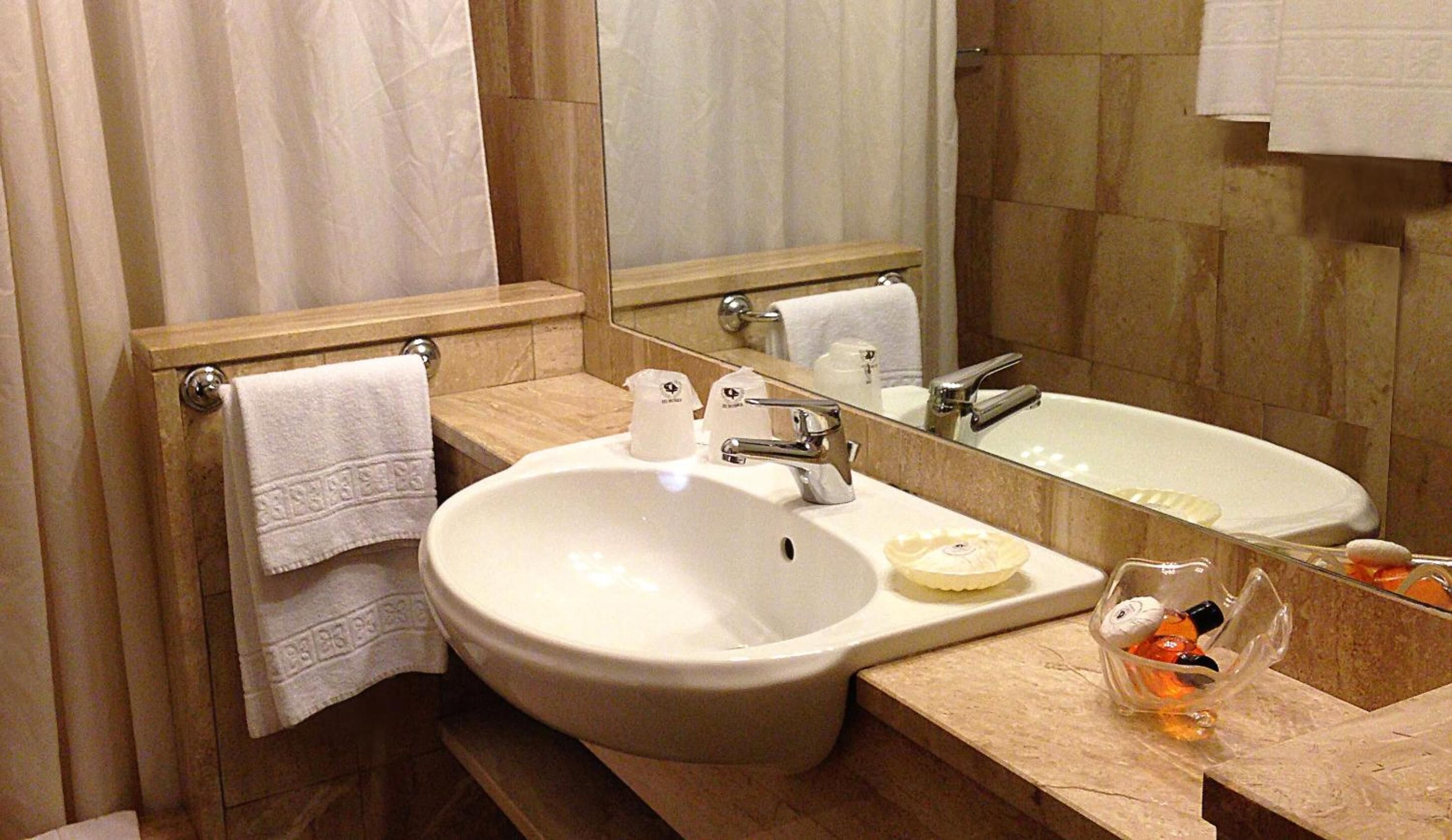 hair dryer, bidet, towels