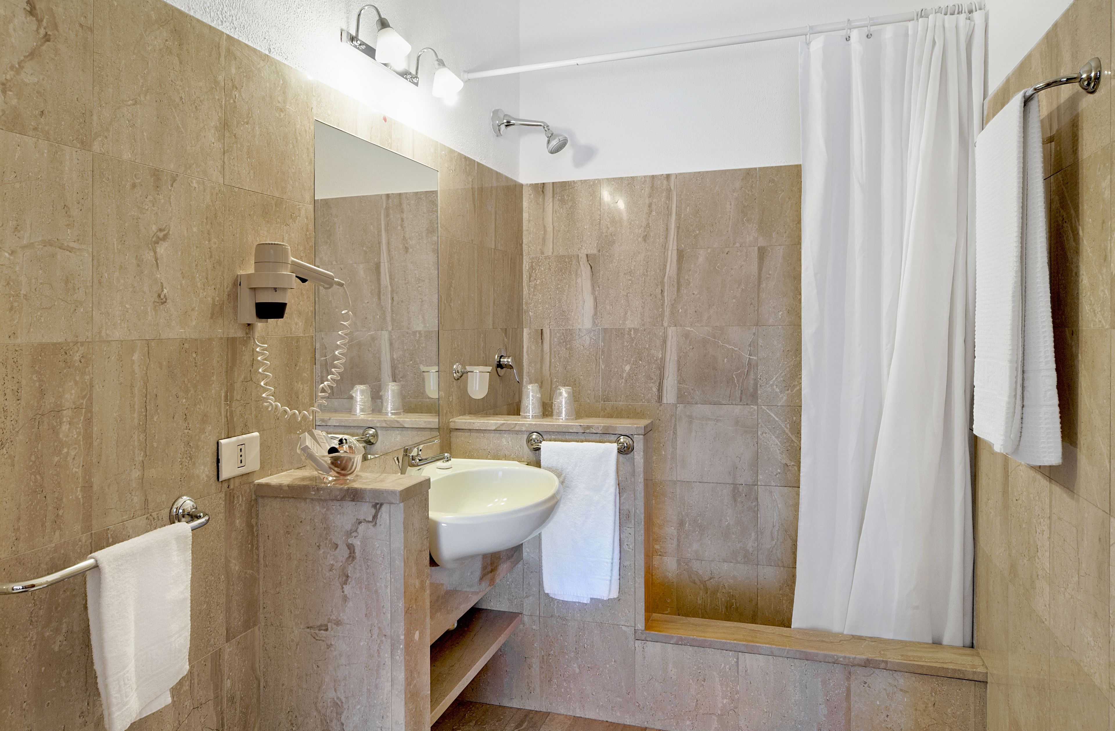 hair dryer, bidet, towels