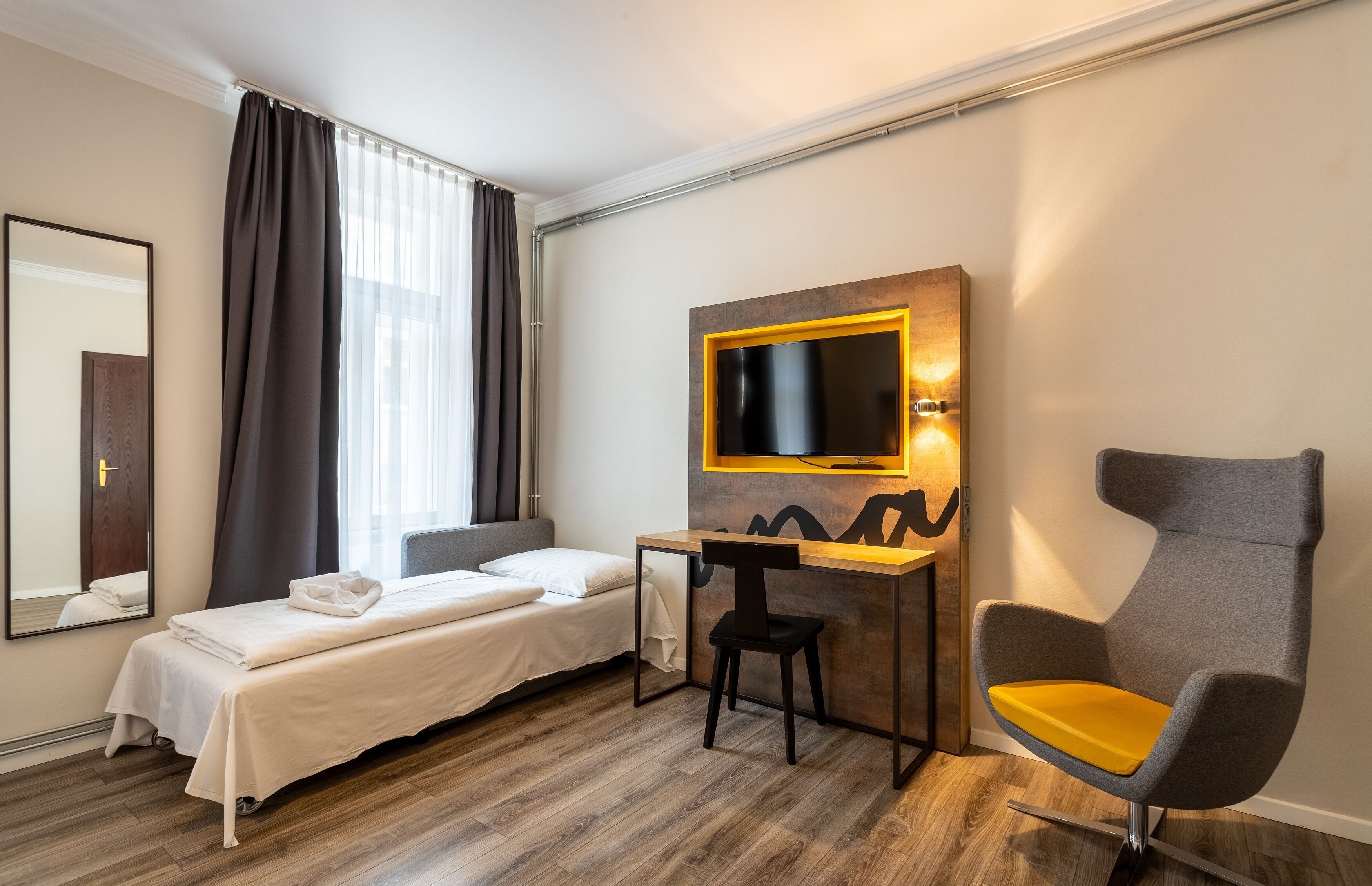 superior triple room | 1 bedroom, in-room safe, desk, blackout curtains