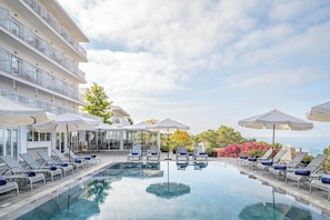 Outdoor pool, pool umbrellas, pool loungers