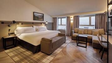 1 bedroom, hypo-allergenic bedding, down comforters, minibar