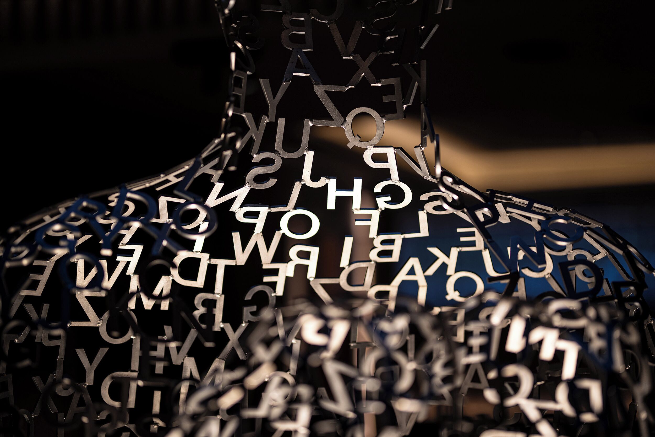 A sculpture with letters and numbers.