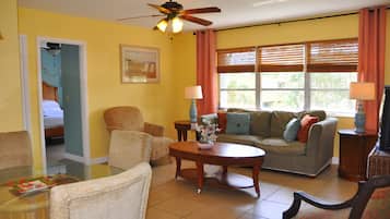 Suite, 1 Bedroom | Living room | Flat-screen TV