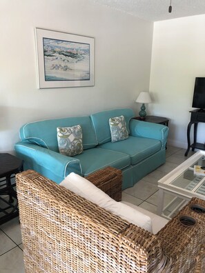 Two-Bedroom Condo - No Resort or Parking fees | Living area | Flat-screen TV