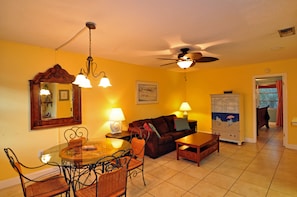 Two-Bedroom Condo - No Resort or Parking fees | Living area | Flat-screen TV