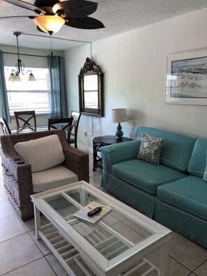 Two-Bedroom Condo - No Resort or Parking fees | Living area | Flat-screen TV