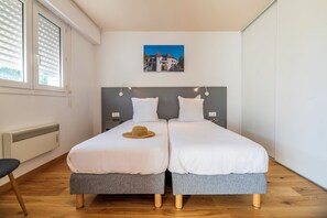 Literie de qualité supérieure, coffres-forts dans les chambres, bureau