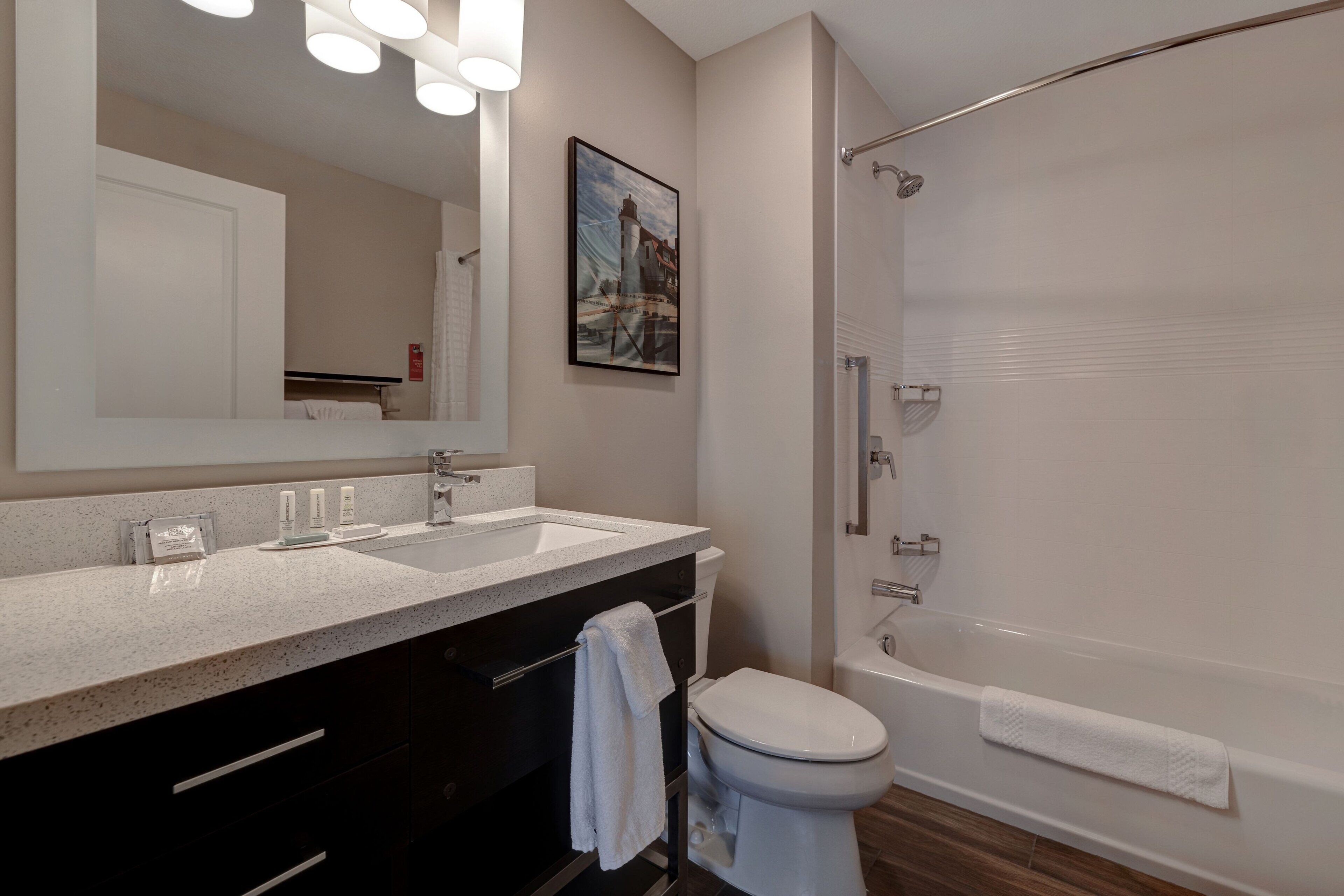 studio, 2 queen beds | bathroom | combined shower/bathtub, hair dryer, towels