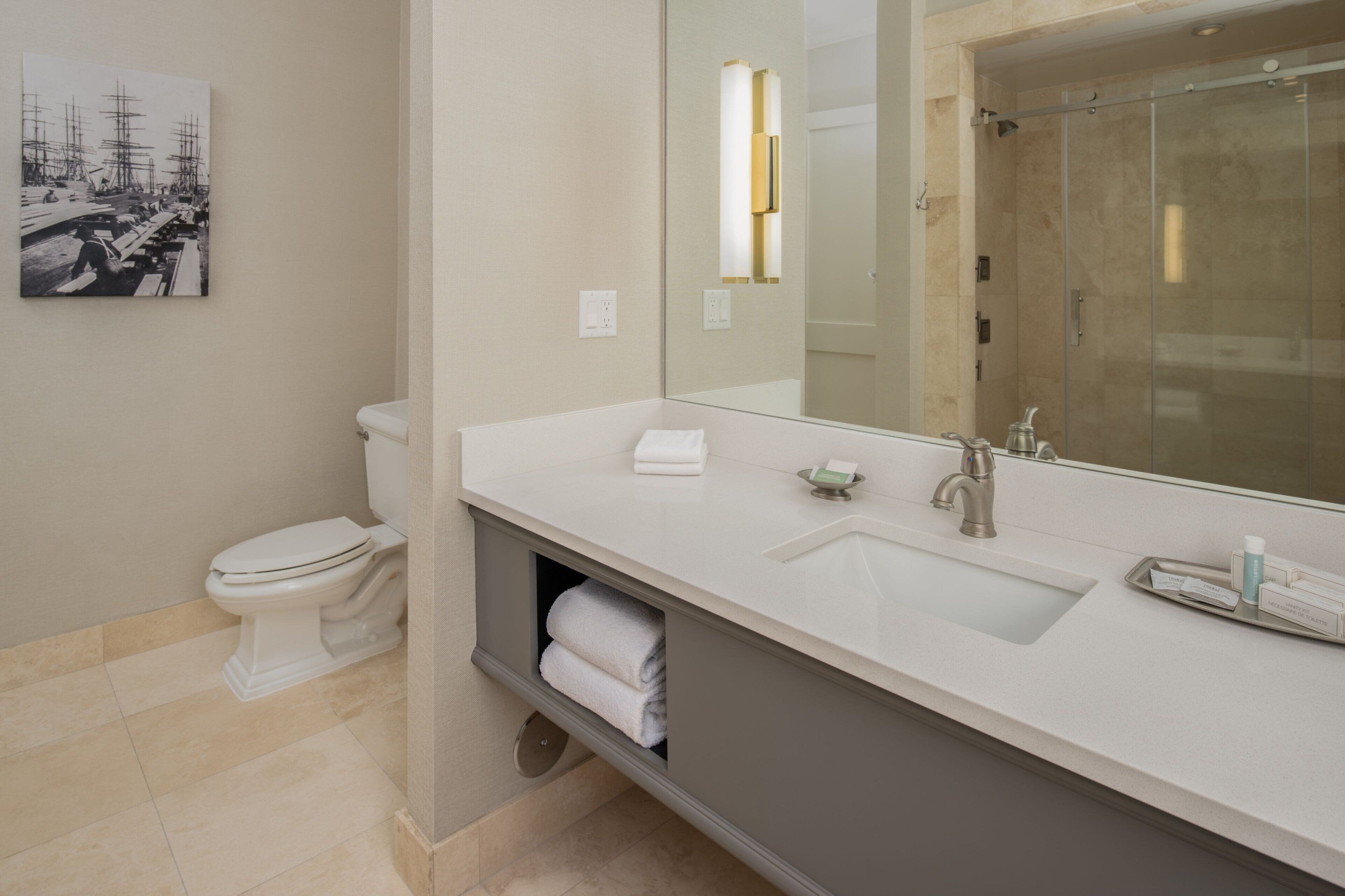 combined shower/bathtub, free toiletries, hair dryer, towels