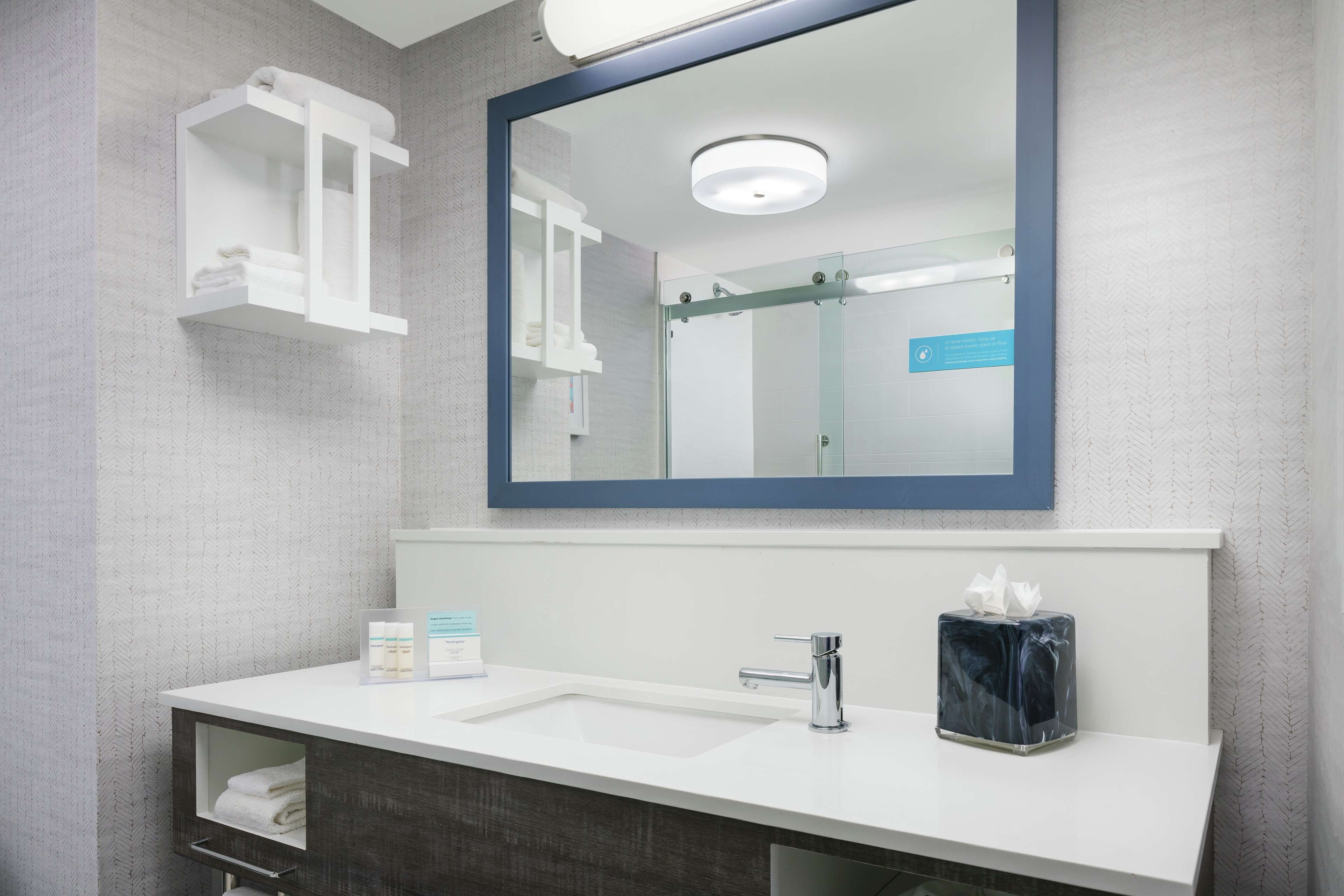 eco-friendly toiletries, hair dryer, towels, soap