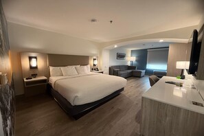 Suite estudio, 1 cama King size, para no fumadores | Edredón, camas con pillow-top y escritorio 