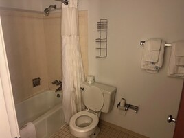 Standard Room, 2 Queen Beds | Bathroom | Combined shower/tub, free toiletries, hair dryer, towels