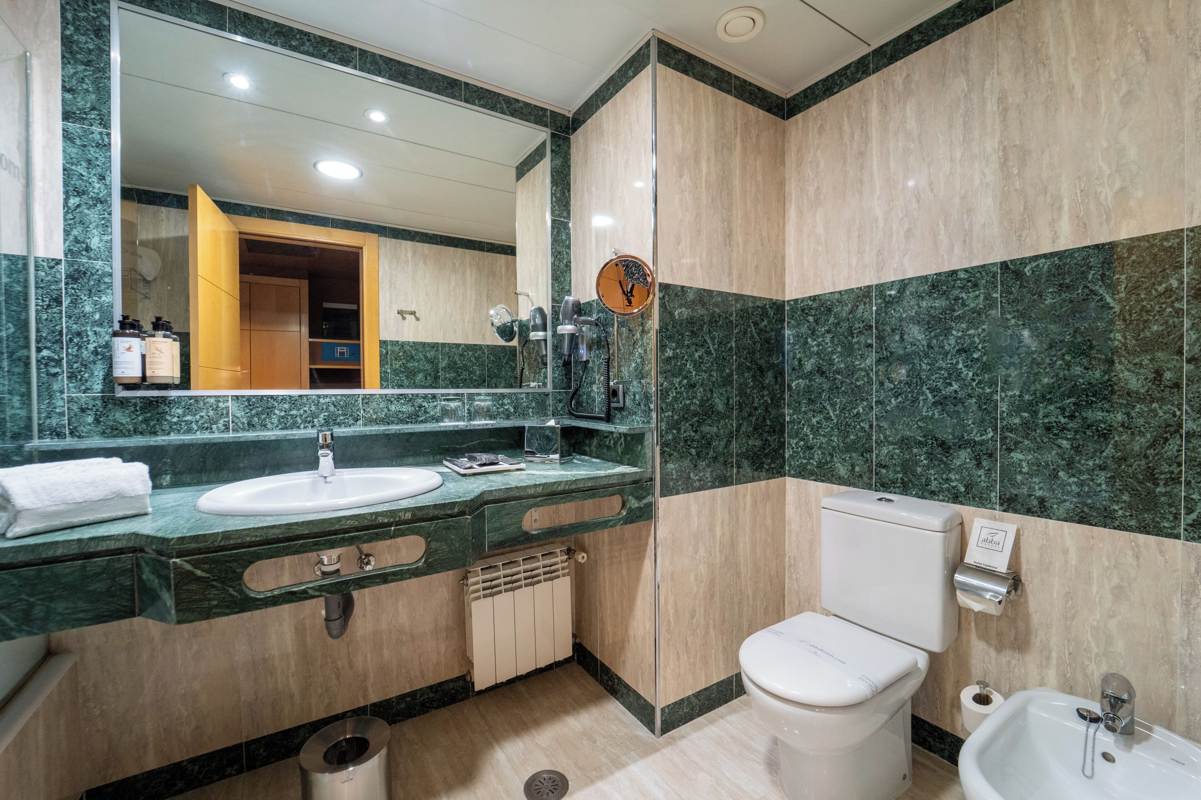 bathtub, free toiletries, hair dryer, bidet