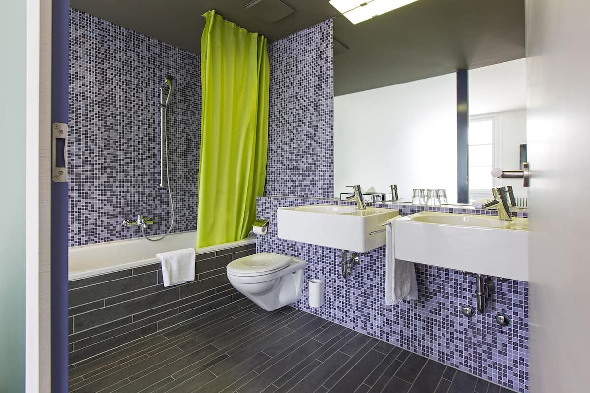 hair dryer, bathrobes, slippers, towels