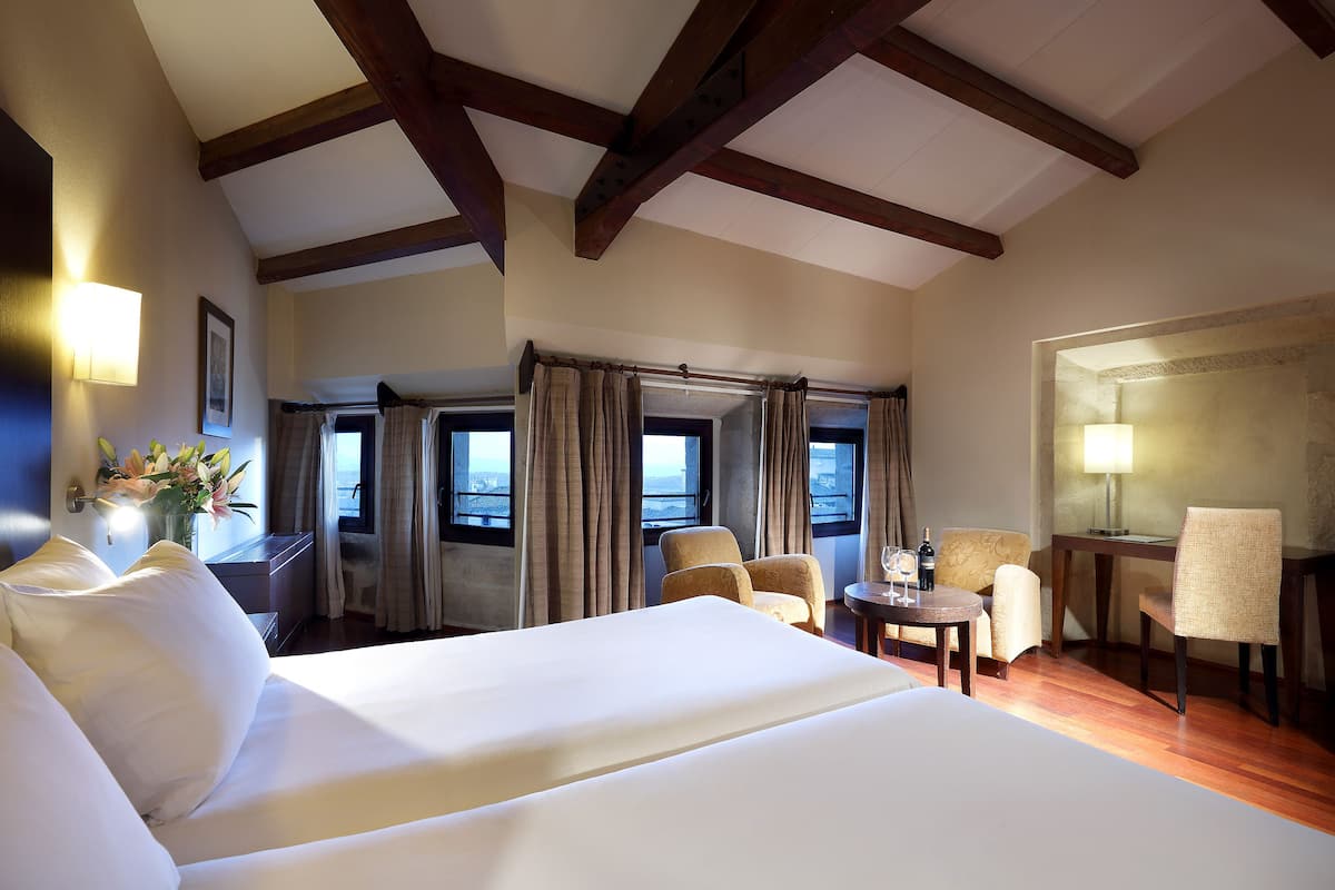 in-room safe, desk, blackout curtains, iron/ironing board