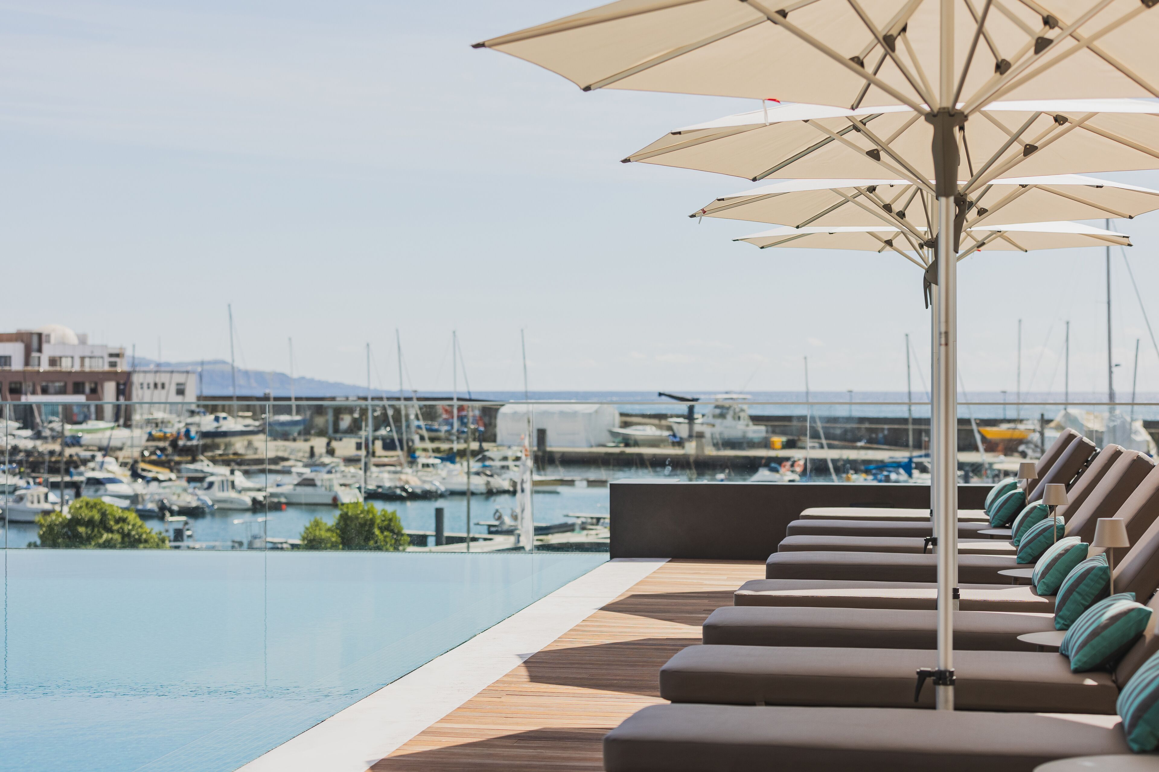 Indoor pool, outdoor pool, pool umbrellas, sun loungers