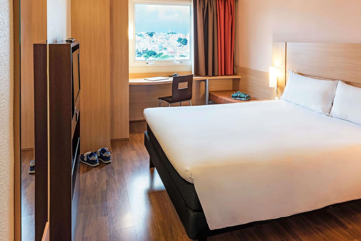 Minibar, Schreibtisch, Verdunkelungsvorhänge, schallisolierte Zimmer