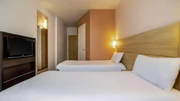 Tomannsrom, 2 enkeltsenger | Minibar, skrivebord, blendingsgardiner og lydisolert