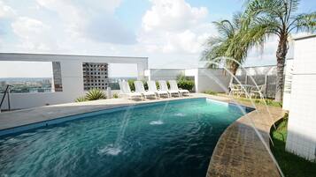 Outdoor pool, sun loungers