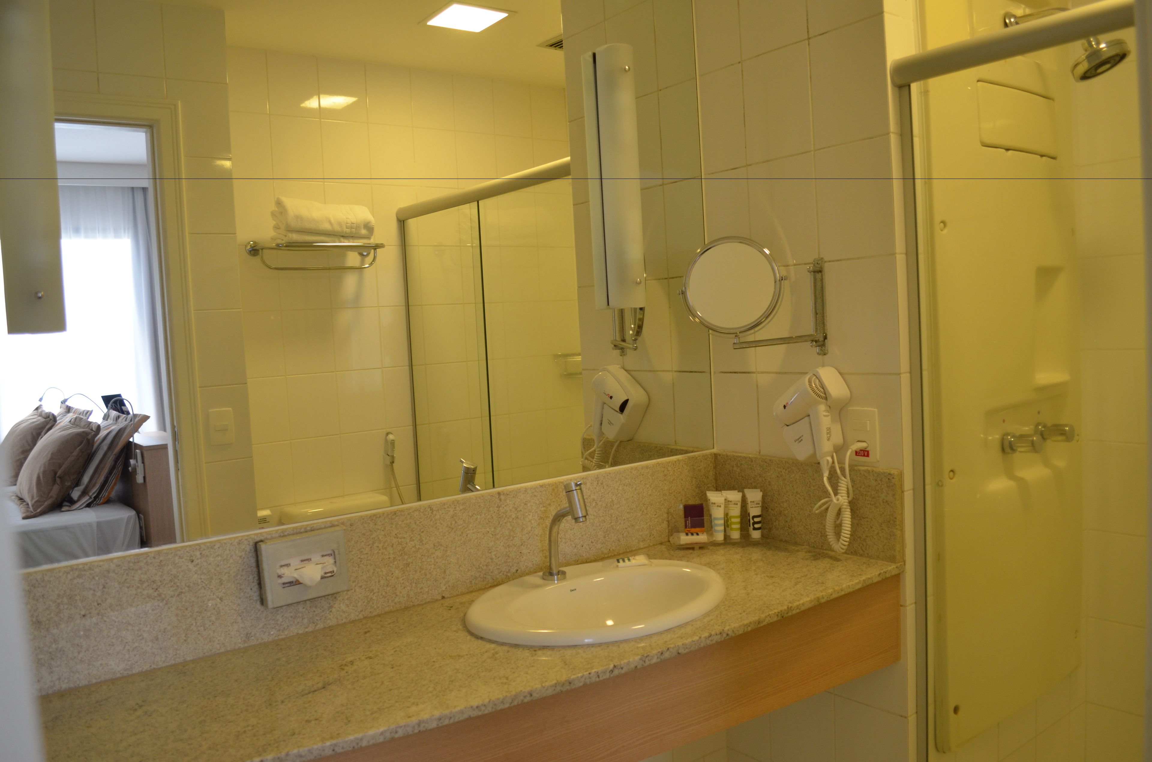 shower, eco-friendly toiletries, hair dryer, towels