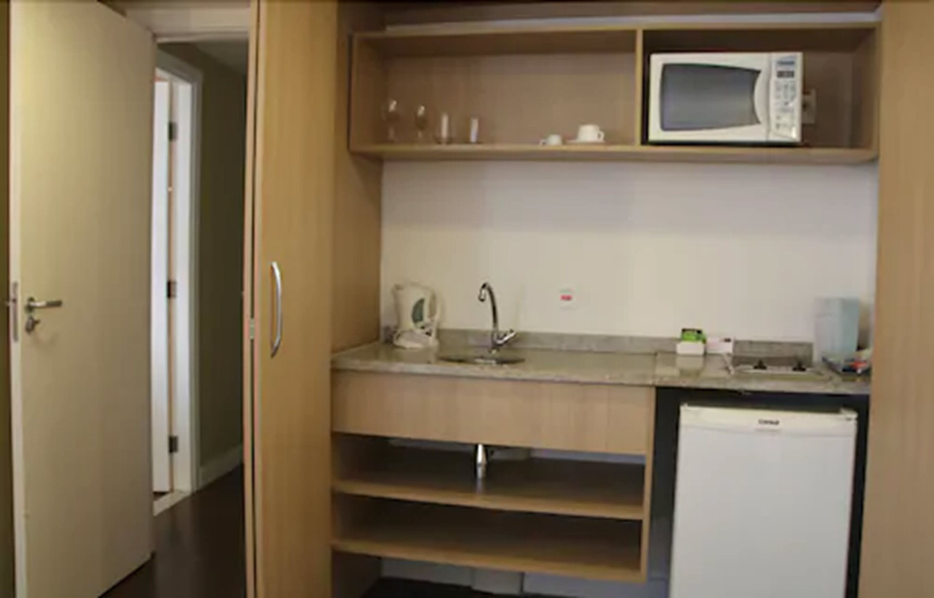 mini-fridge, microwave, stovetop, electric kettle