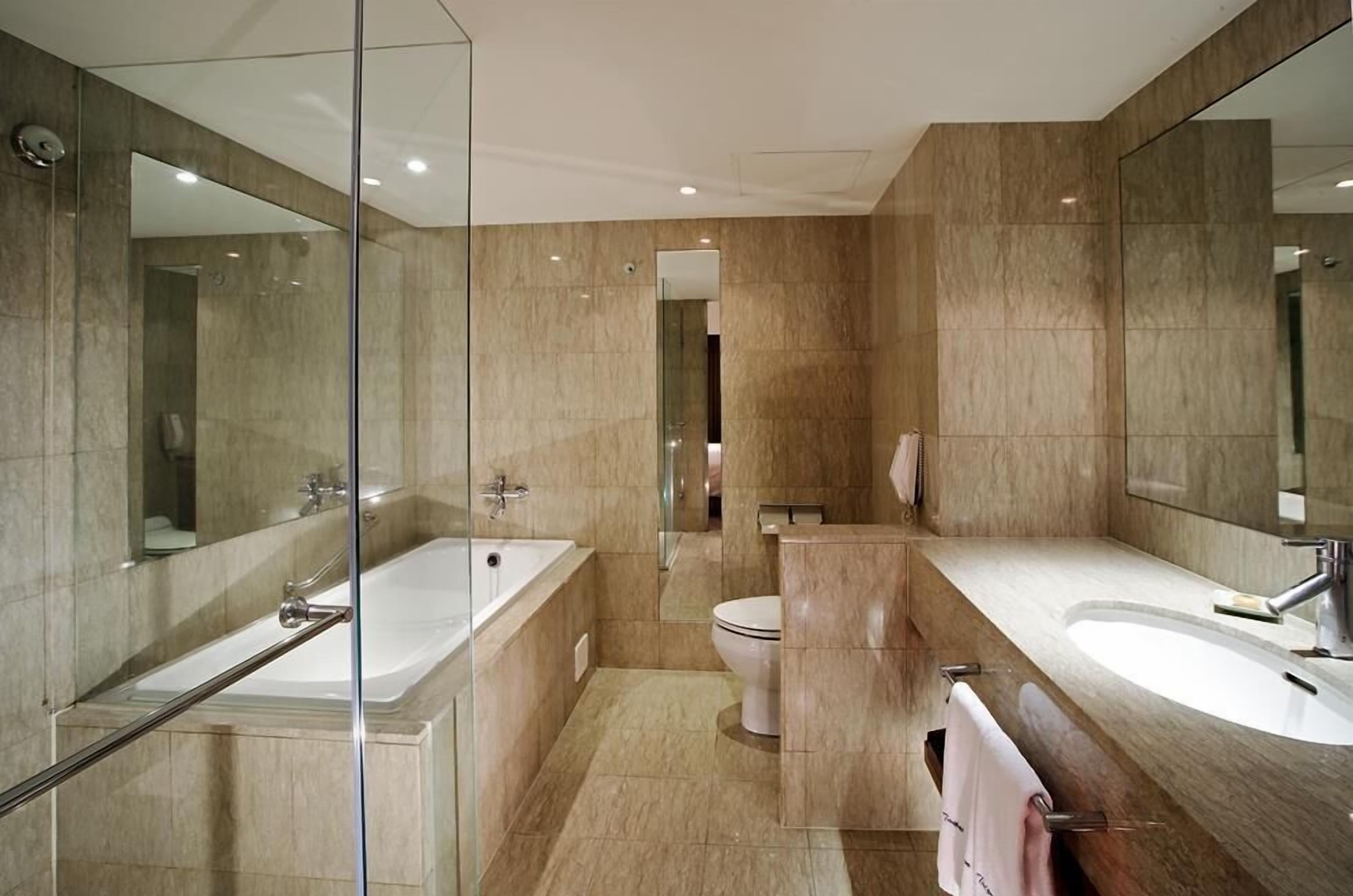 presidential suite, 1 king bed | bathroom | shower, free toiletries, hair dryer, bathrobes