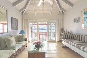 21-inch TV with cable channels - Fort Recovery Beachfront Villa & Suites Hotel (West End)