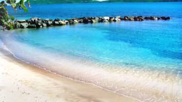 Private beach, white sand, sun loungers, beach towels