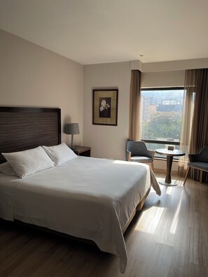Junior Suite, 1 King Bed with Sofa bed | Premium bedding, in-room safe, desk, blackout drapes