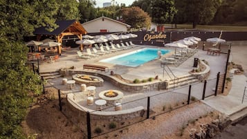 Seasonal outdoor pool, open 9:00 AM to 11:00 PM, pool umbrellas