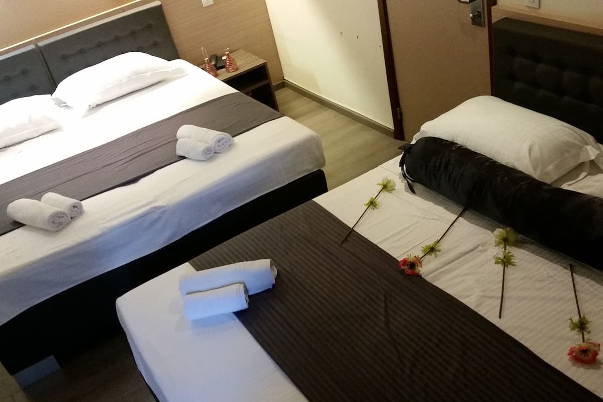 Quadruple Room | Premium bedding, in-room safe, desk, soundproofing