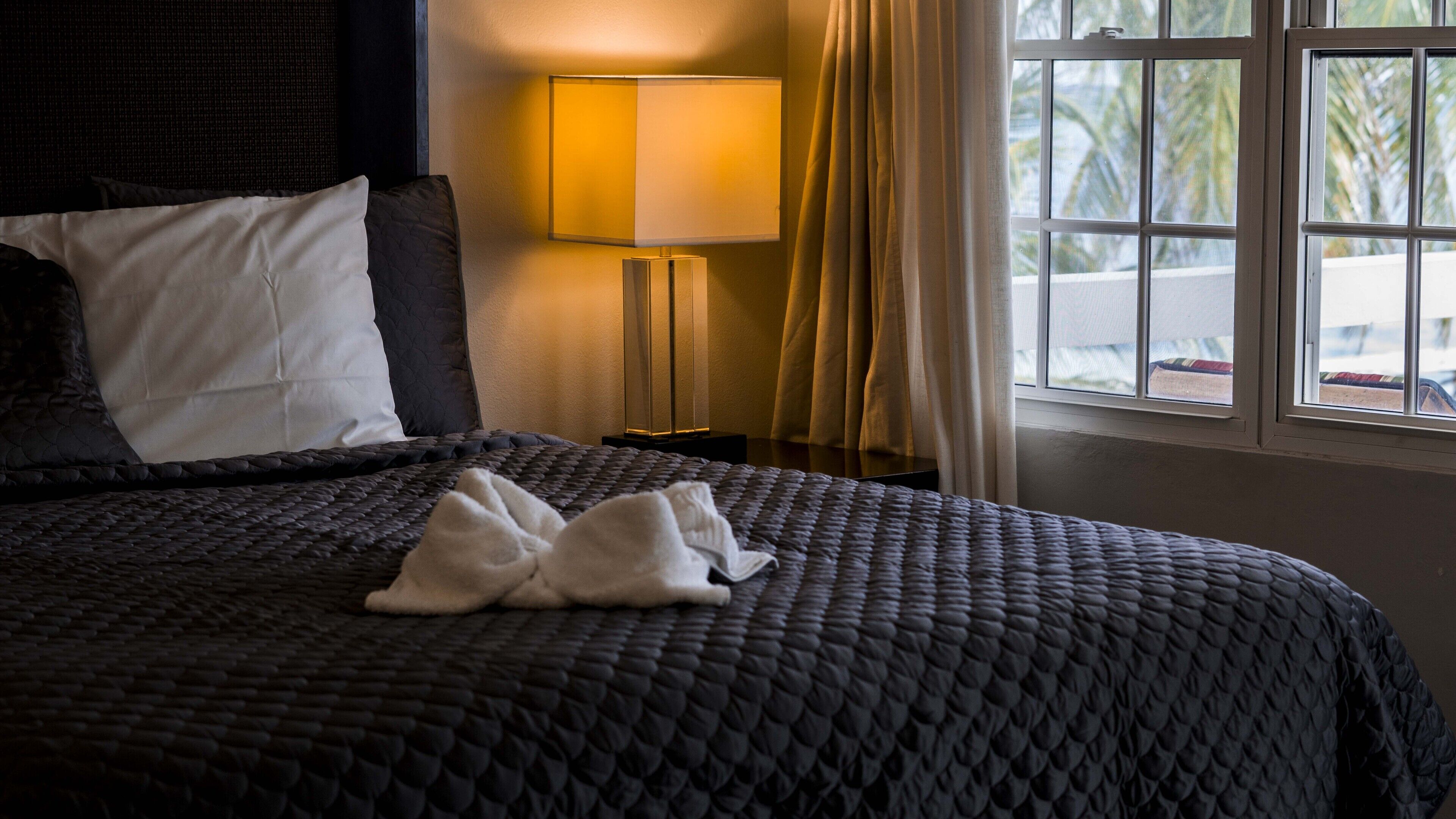 Ocean View King Room with Balcony | In-room safe, desk, free WiFi, bed sheets
