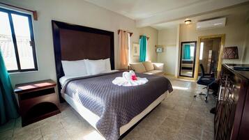 Deluxe Room | 1 bedroom, in-room safe, desk, free WiFi