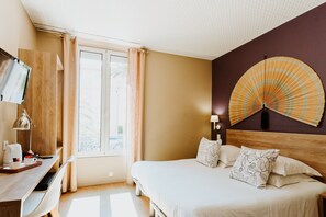 Standard Double Room | Minibar, in-room safe, desk, blackout drapes